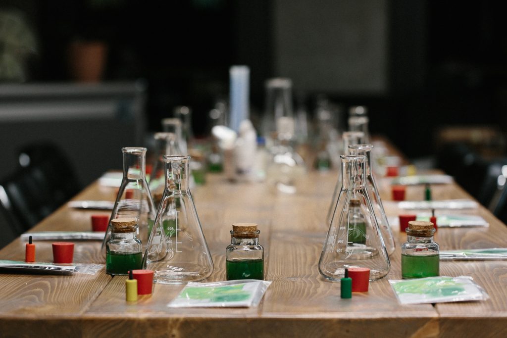 A table full of beakers, ready for the Algature workshop series