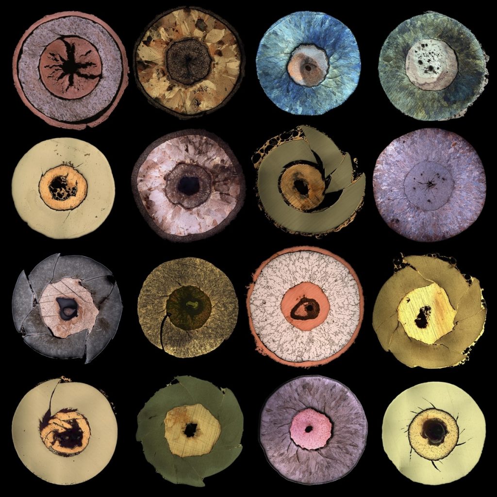 Colourful circles on a black background. Fossils: Electromagnetic collapse of metallic cylinders