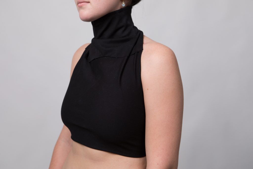 a black cloth neck brace