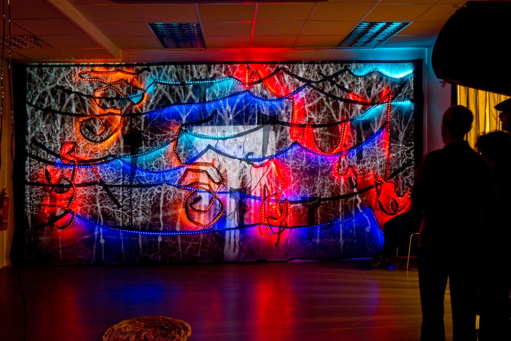 Light display on a wall in a room 