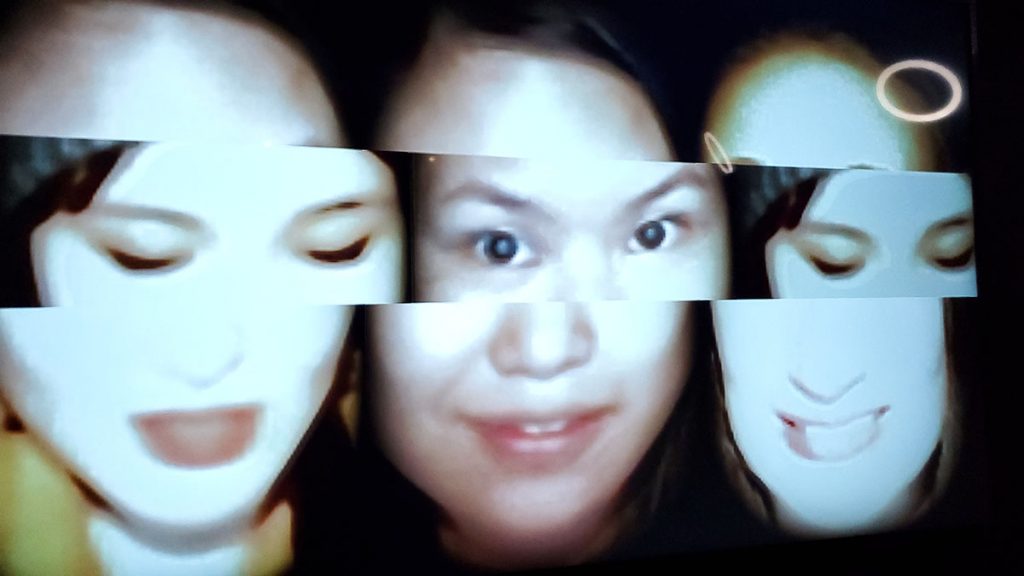 Three faces shown side by side with a strip encompassing the eyes of all faces. The strip is slightly off so that the middle portion of the faces are not matched with the rest of the faces. 