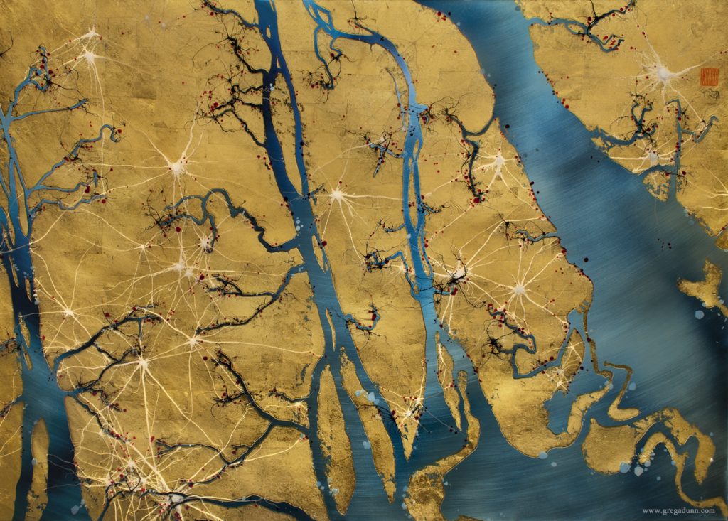 Landscape that looks like an aerial view of a river system. There are winding blue rivers among the golden land. 